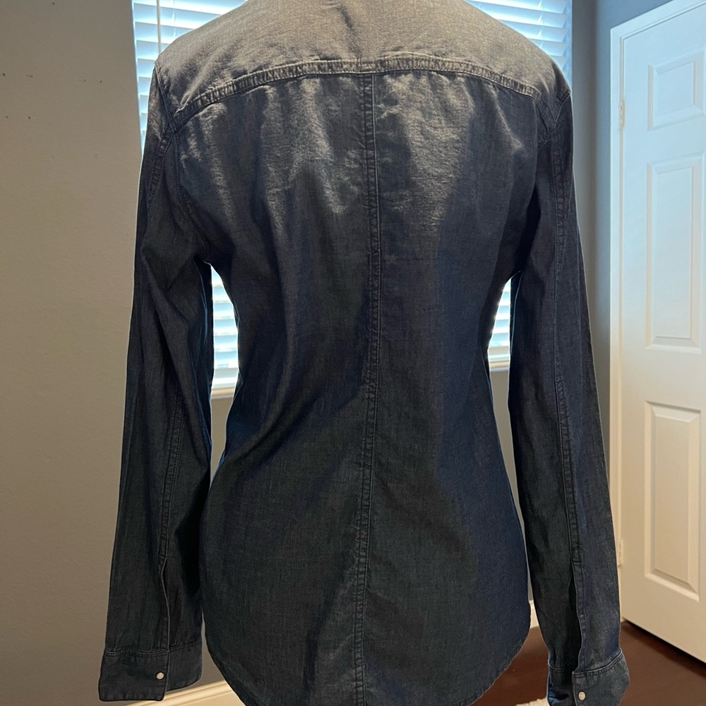 - Calvin Klein denim long sleeve top with snaps in front. - Picture 2 of 6